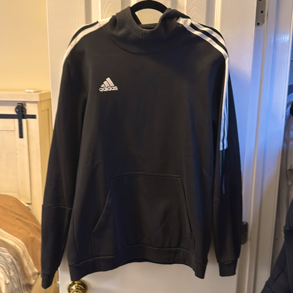 Black Adidas sweatshirt with white semi-mesh arms, white stripes